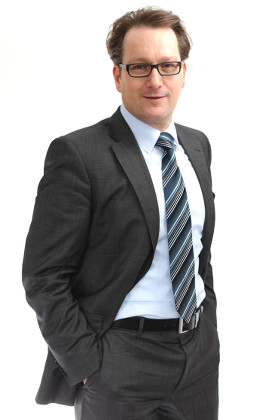 Dr. Alexander Schmid